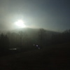 Sonne kämpft gegen Morgennebel über dem Waldhotel "Sachsenstern"